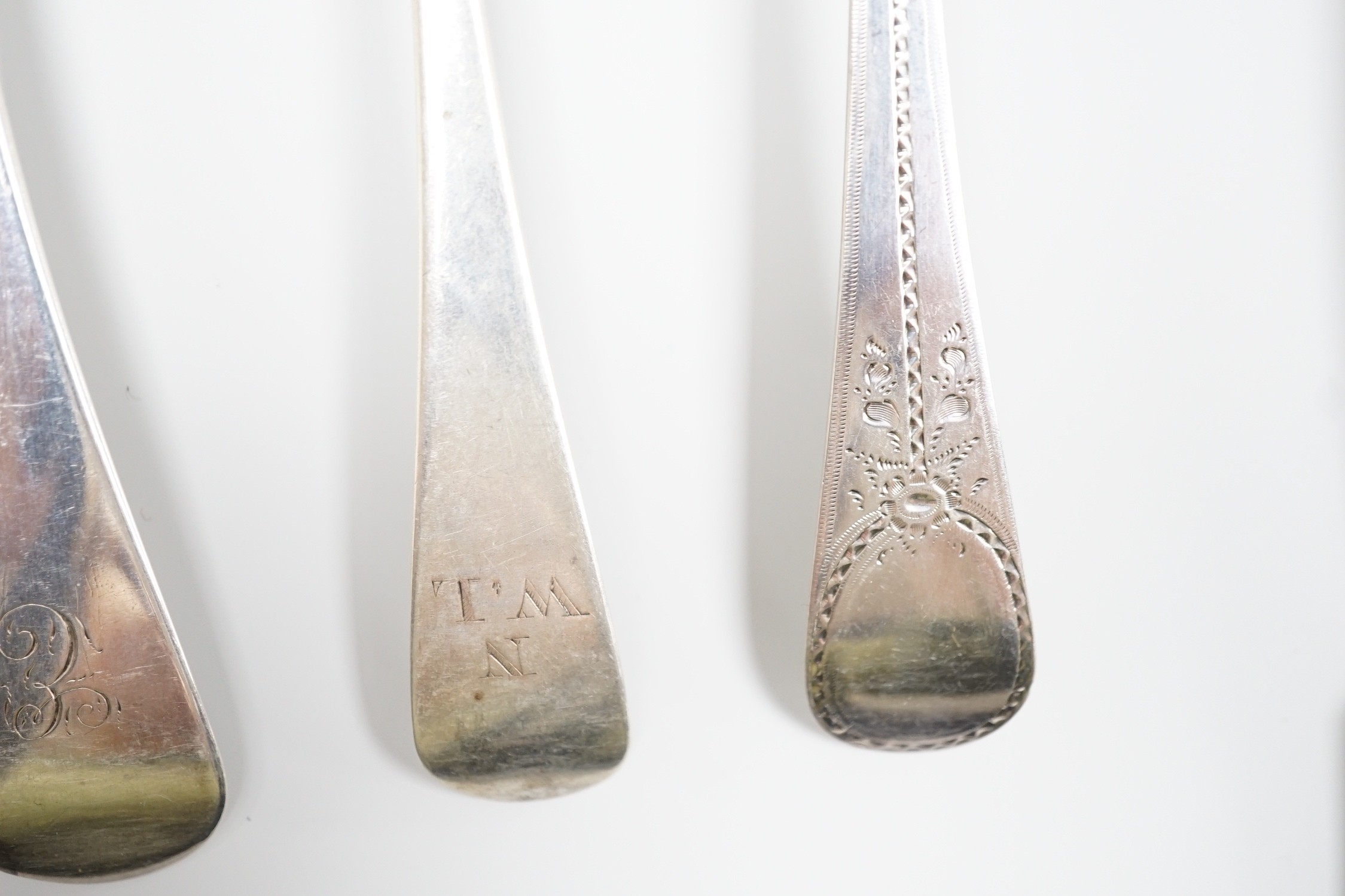 A George III silver fiddle pattern basting spoon, London, 1804 and seven other items of mainly 19th century silver flatware, 18.6oz.